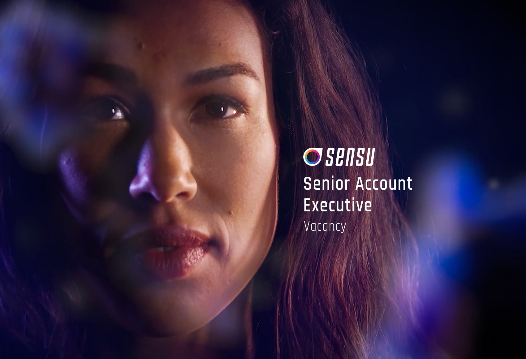 Female model surrounded by blurry antibodies looking up, alongside the text: Sensu, Senior Account Executive, Vacancy