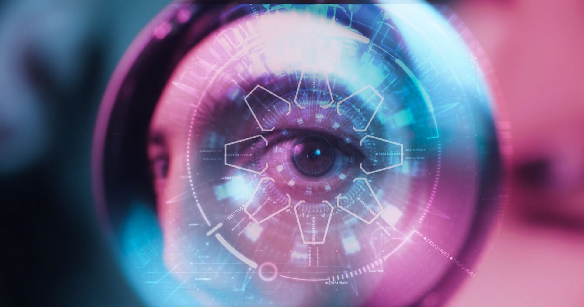 This image shows an eye looking at the camera surrounded by a lens with an animation overlay small