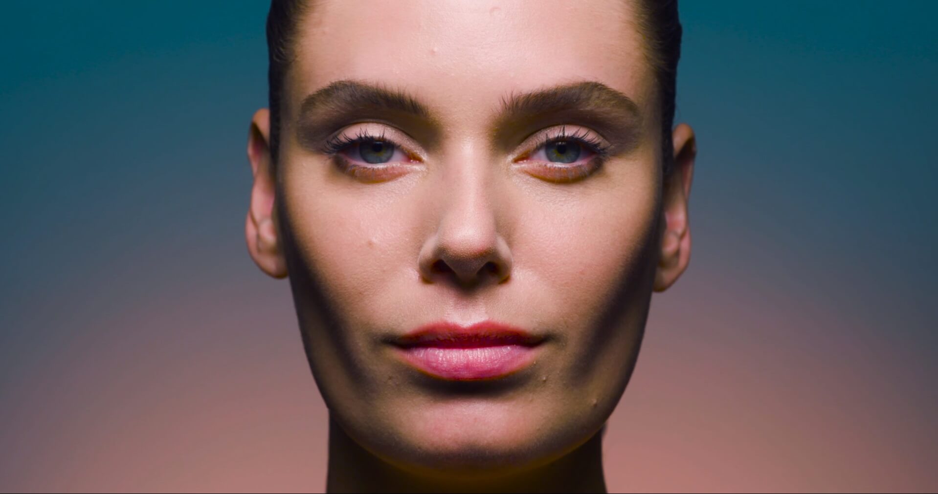 This image shows a female face looking straight in the camera